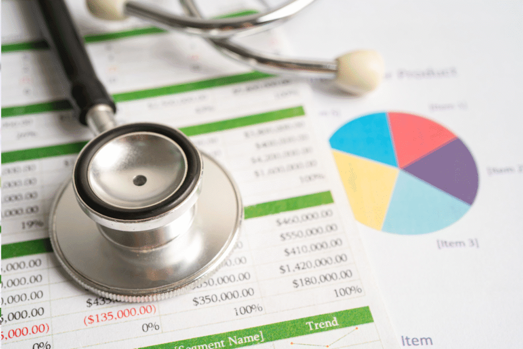 Hospice billing specialist reviewing NOE deadlines and Medicare hospice claim errors