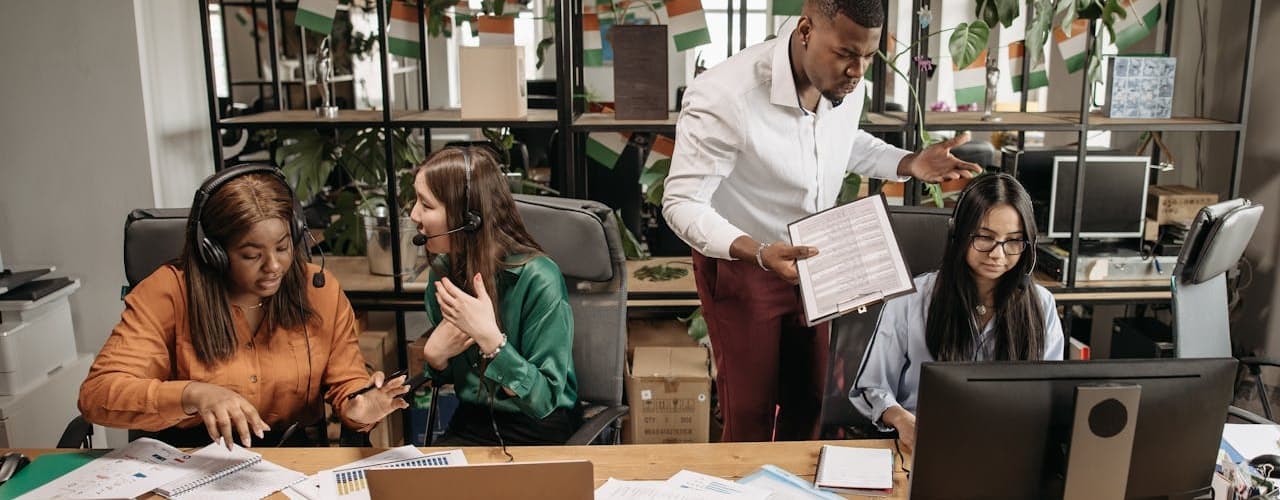 Customer service team working at desk