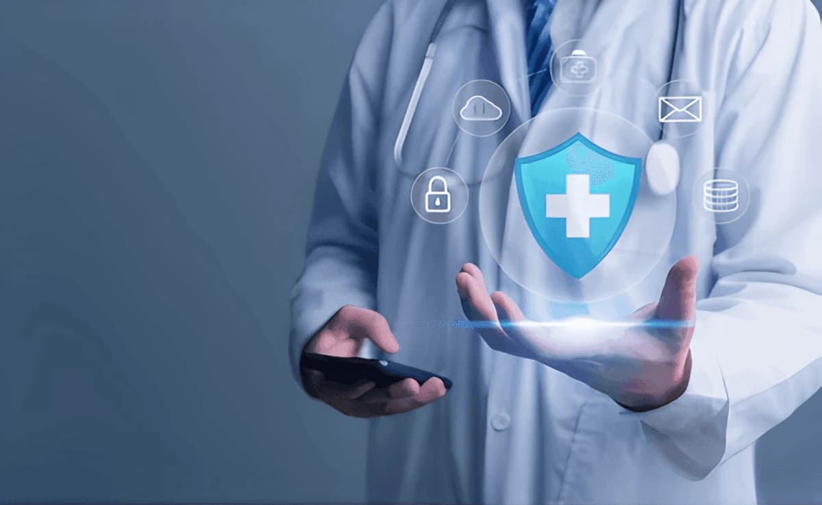 Doctor holding protective shield representing safety and compliance